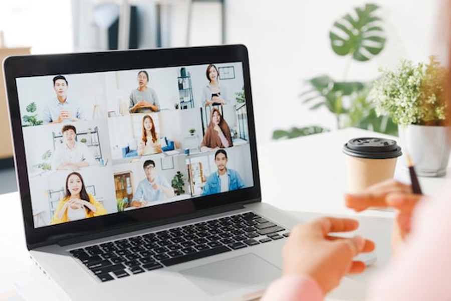Young Asia Businesswoman Using Laptop Talk Colleague About Plan Video Call Meeting While Work From Home Living Room 7861 3145(1)